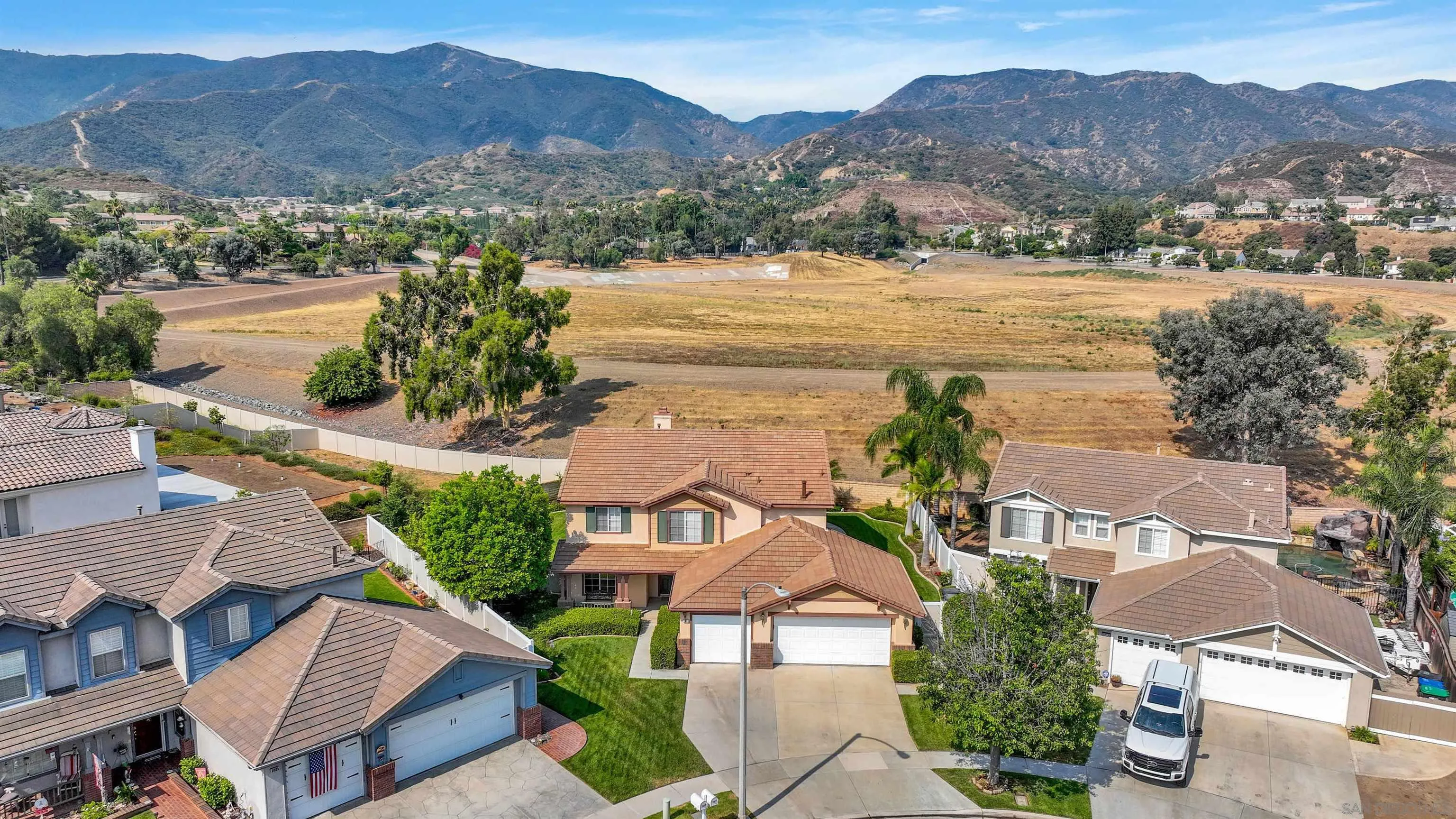 3080 Nightwind Circle Corona, CA 92882 - Photo 54 of 62 an aerial view of residential houses with outdoor space and river
