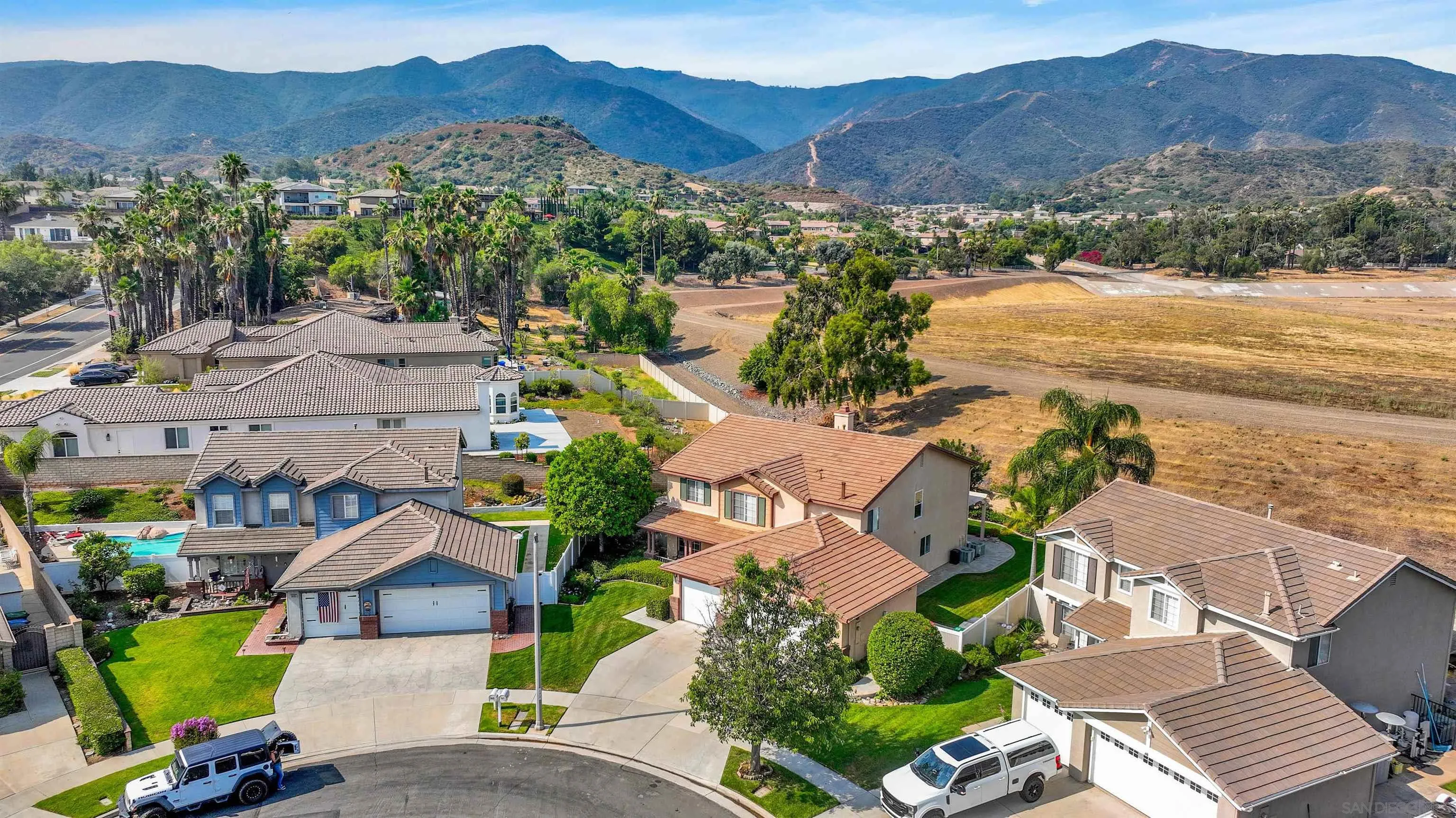 3080 Nightwind Circle Corona, CA 92882 - Photo 55 of 62 an aerial view of a house with a garden