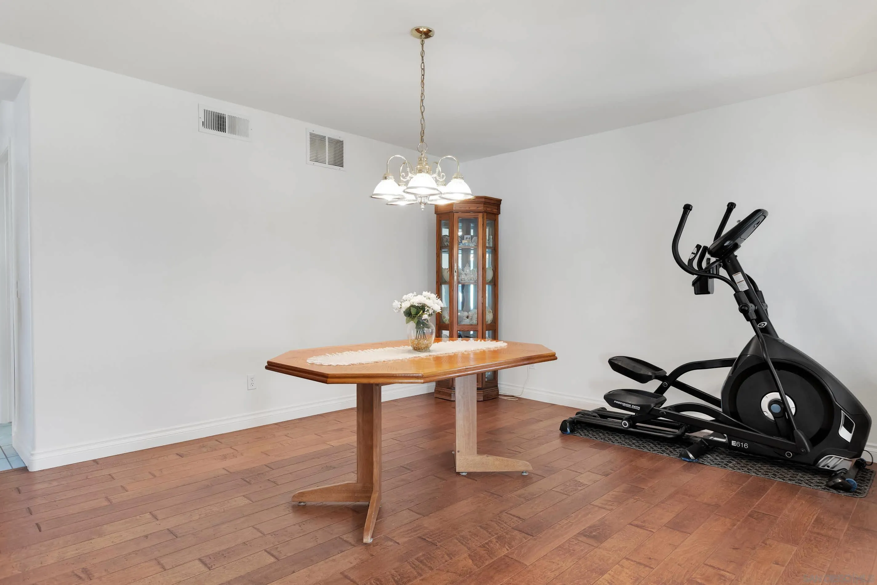 3080 Nightwind Circle Corona, CA 92882 - Photo 8 of 62 a view of a room with gym equipment