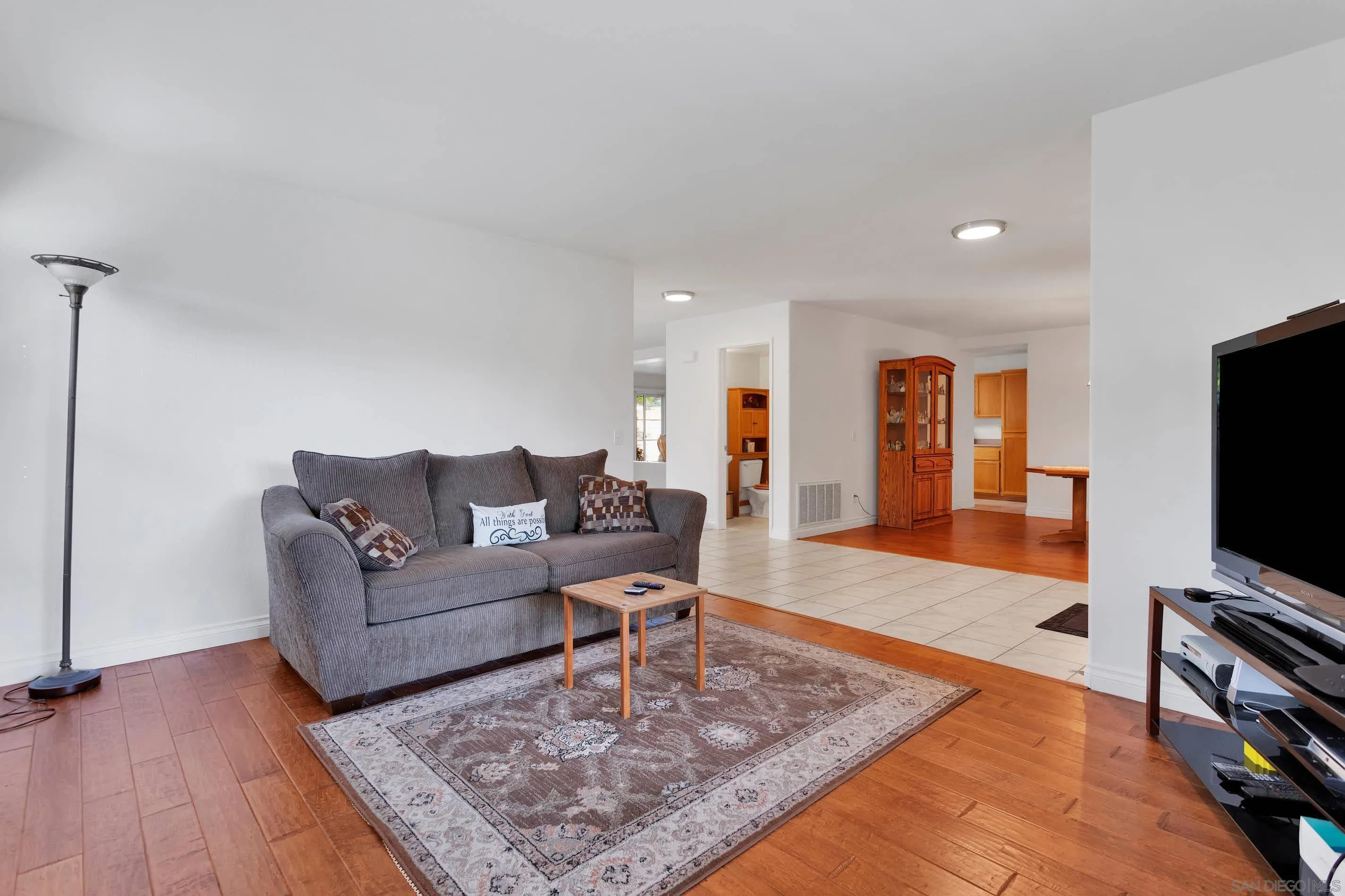 3080 Nightwind Circle Corona, CA 92882 - Photo 10 of 62 a living room with furniture and a flat screen tv