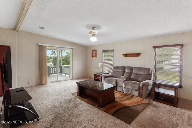 a room with a bed and a window