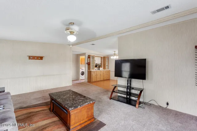 a view of a street with wooden floor