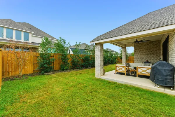 a outdoor living space with furniture and garden view
