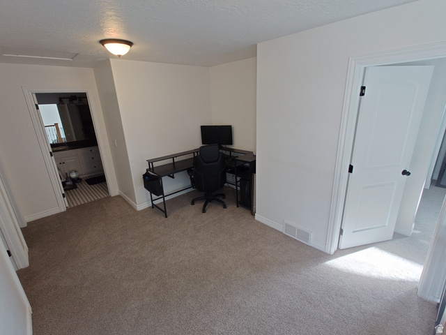552 Sunset Crest Way Draper, UT 84020 - Photo 31 of 68 Office with light colored carpet and a textured ceiling