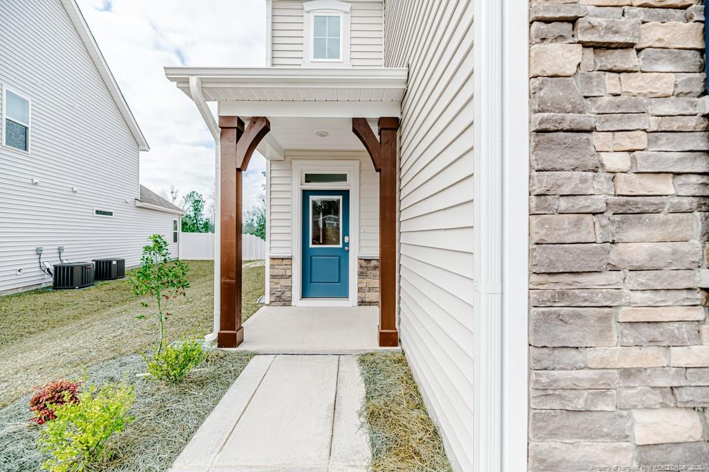175 Marlborough Street Raeford, NC 28376 - Photo 2 of 22 a front view of a house with a yard