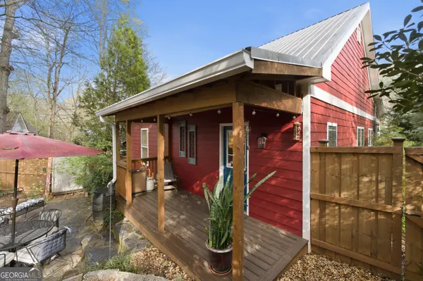 a front view of a house with yard