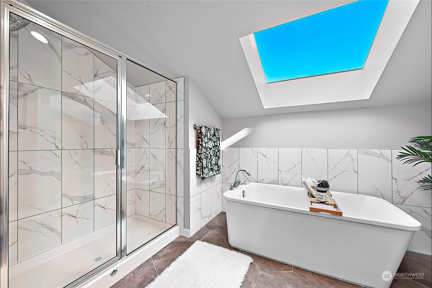 23026 30th Drive Southeast Bothell, WA 98021 - Photo 22 of 40 a bathroom with a bathtub and a shower