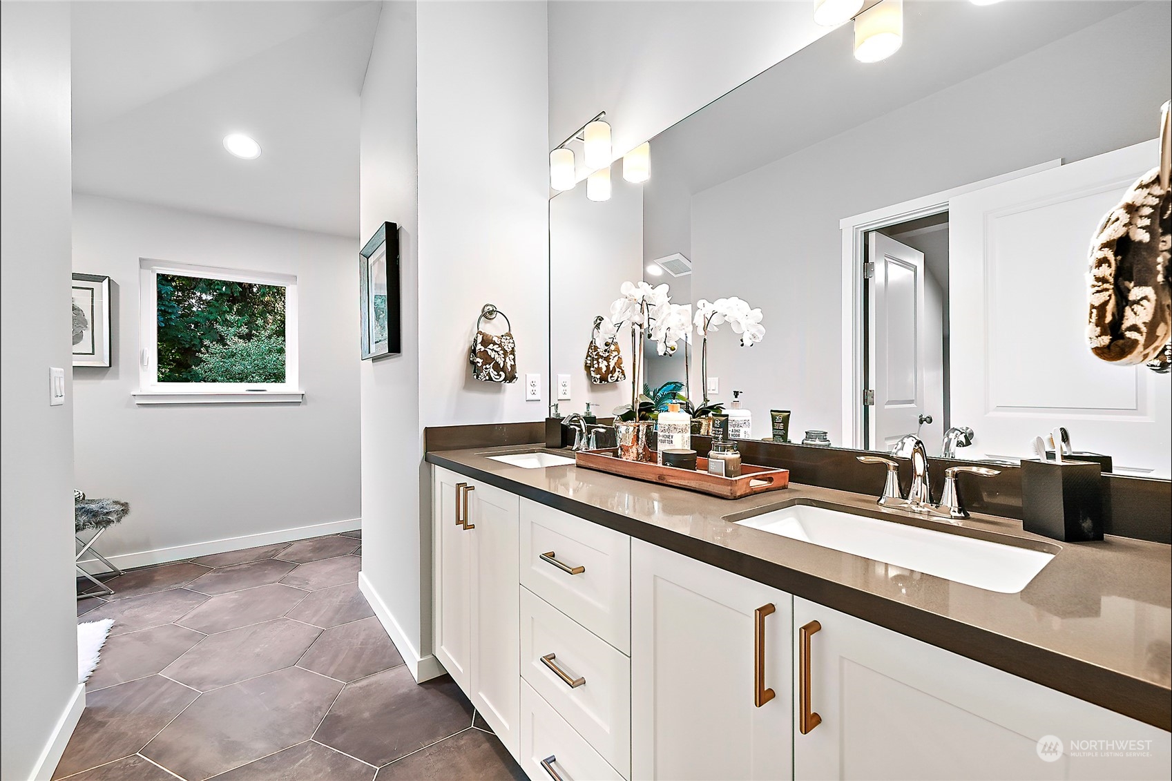 23026 30th Drive Southeast Bothell, WA 98021 - Photo 23 of 40 a spacious bathroom with a double vanity sink and a mirror