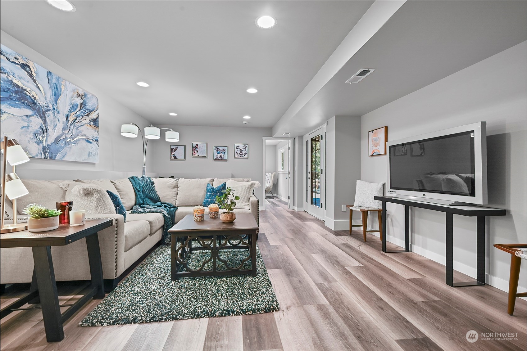 23026 30th Drive Southeast Bothell, WA 98021 - Photo 24 of 40 a living room with furniture and a flat screen tv