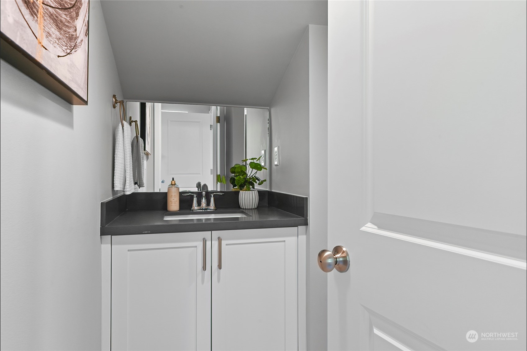 23026 30th Drive Southeast Bothell, WA 98021 - Photo 30 of 40 a bathroom with a granite countertop sink and a mirror