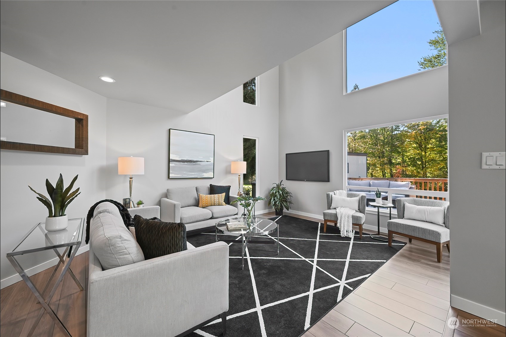 23026 30th Drive Southeast Bothell, WA 98021 - Photo 33 of 40 a living room with furniture a large window and a potted plant