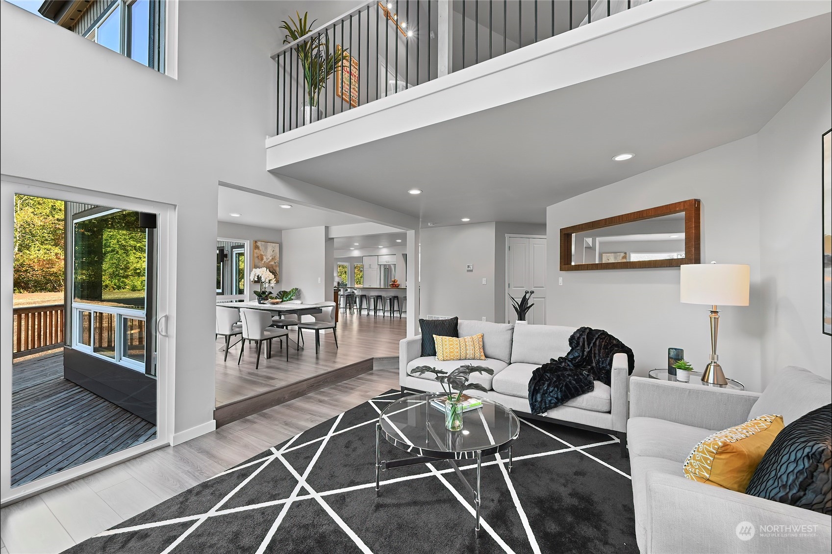 23026 30th Drive Southeast Bothell, WA 98021 - Photo 34 of 40 a living room with furniture a wooden floor and next to a window
