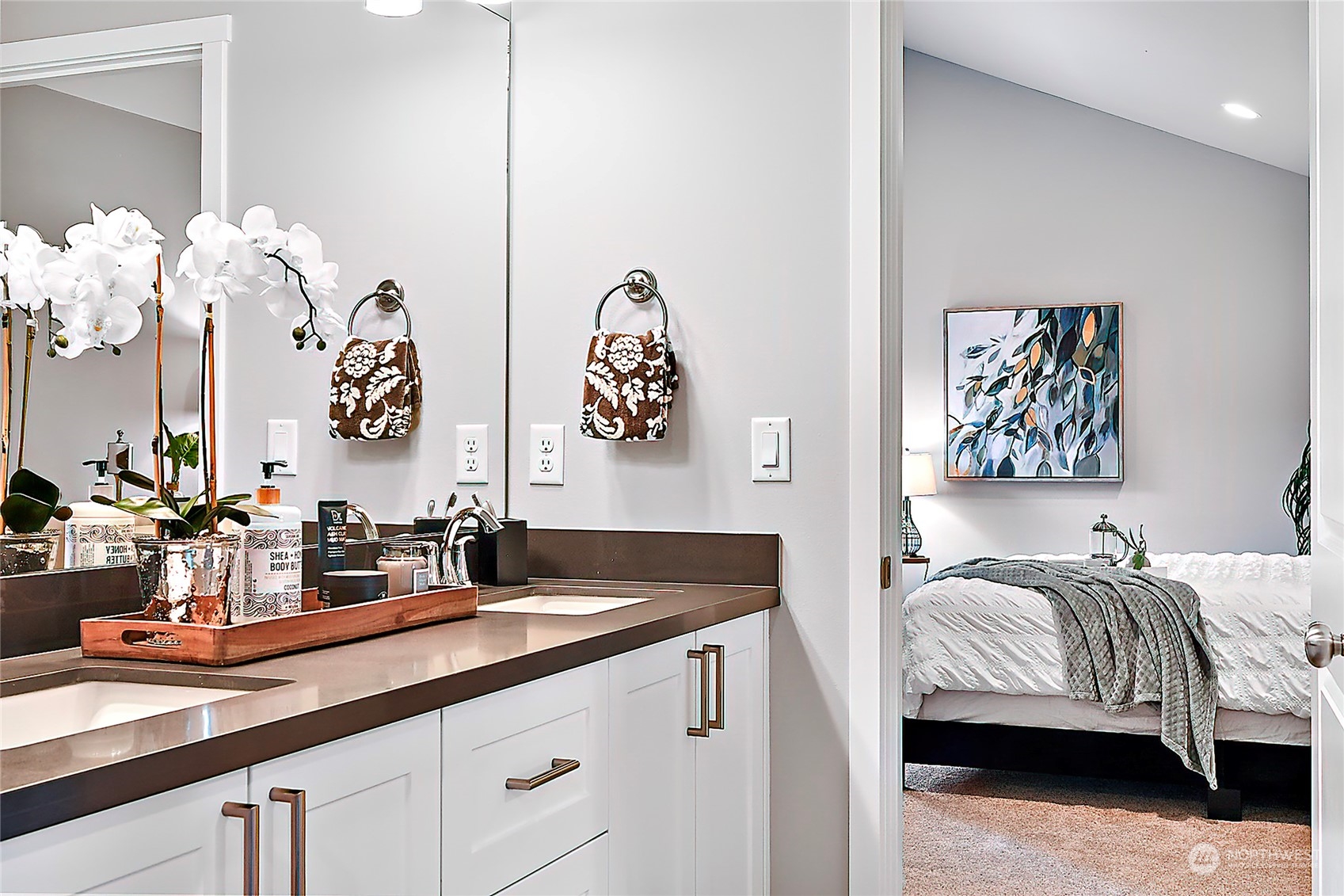 23026 30th Drive Southeast Bothell, WA 98021 - Photo 37 of 40 a en suite bathroom with a double vanity sink and a mirror