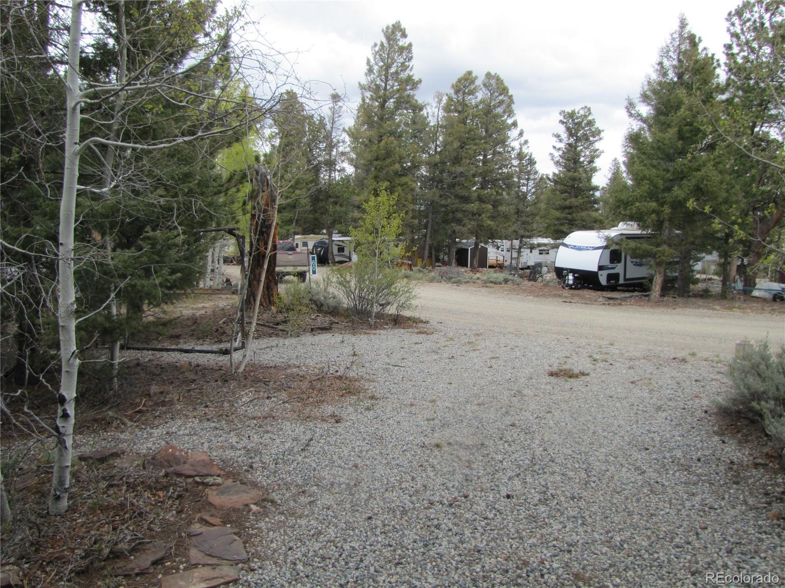 60 Rail Way Fairplay, CO 80440 - Photo 9 of 18 a view of a house with truck parked on the road