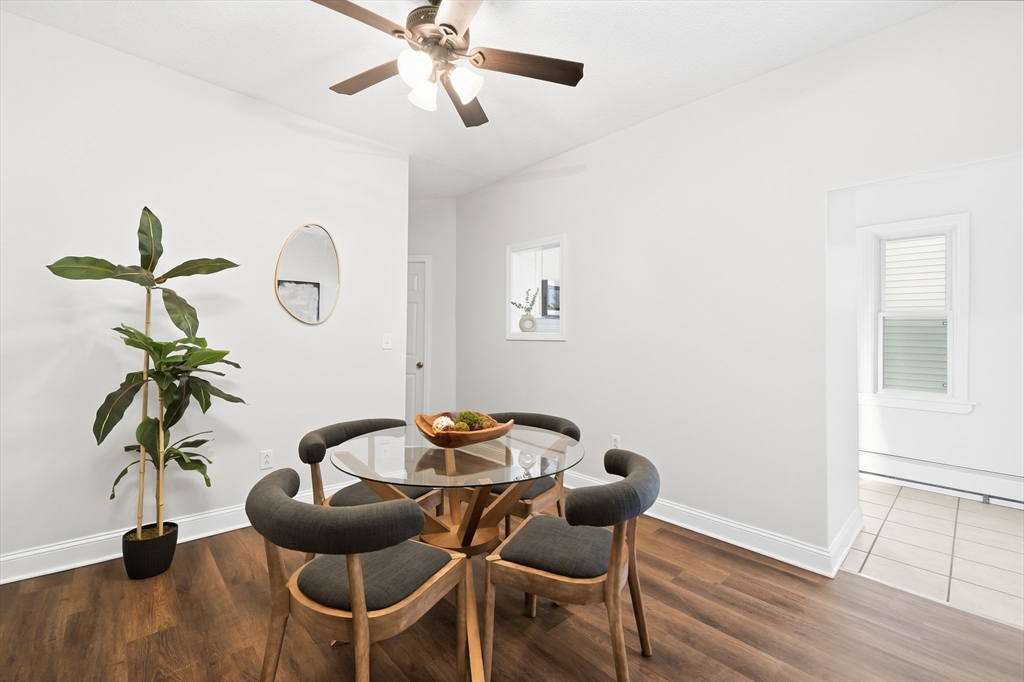 8 Humboldt Avenue, Unit 2 Boston, MA 02119 - Photo 18 of 39 a dining room with furniture and wooden floor