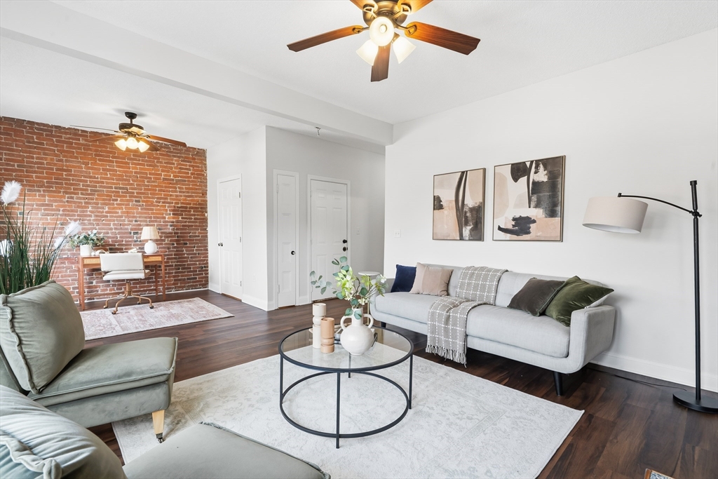 8 Humboldt Avenue, Unit 2 Boston, MA 02119 - Photo 24 of 39 a living room with furniture and a large window
