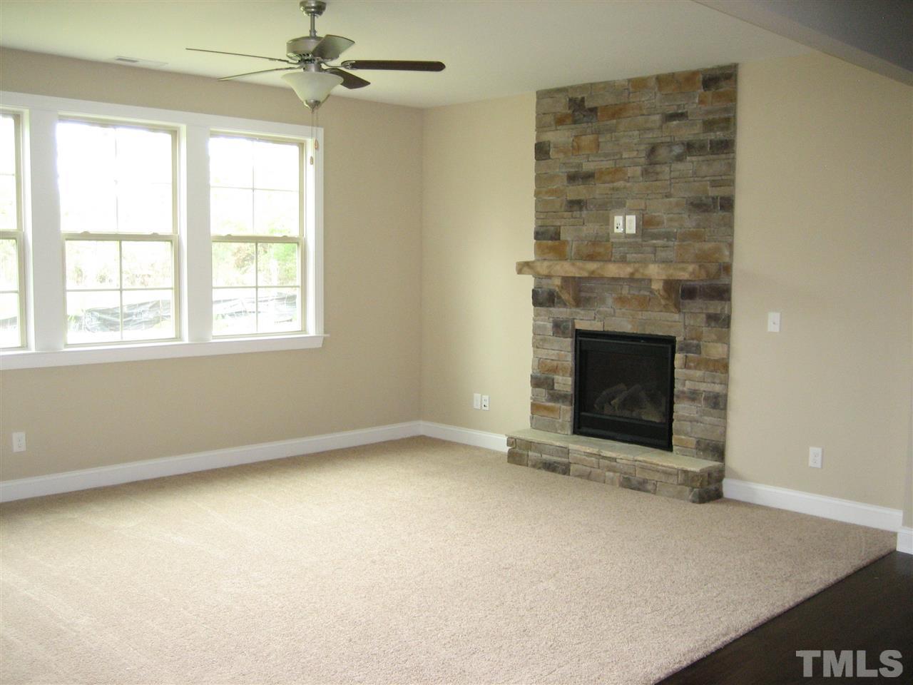 3614 Greenville Loop Road Wake Forest, NC 27587 - Photo 8 of 22 Stonefire place - Nantucket Dune wall Color so Rich. Lot of windows for Natural light