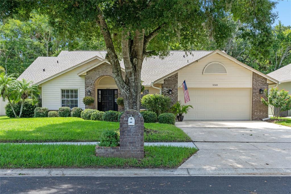 1048 High Point Loop Longwood, FL 32750 - Photo 1 of 1 Front view of 1048 High Point Loop, Longwood, FL - Beautifully maintained home & landscaping in Crystal Creek!