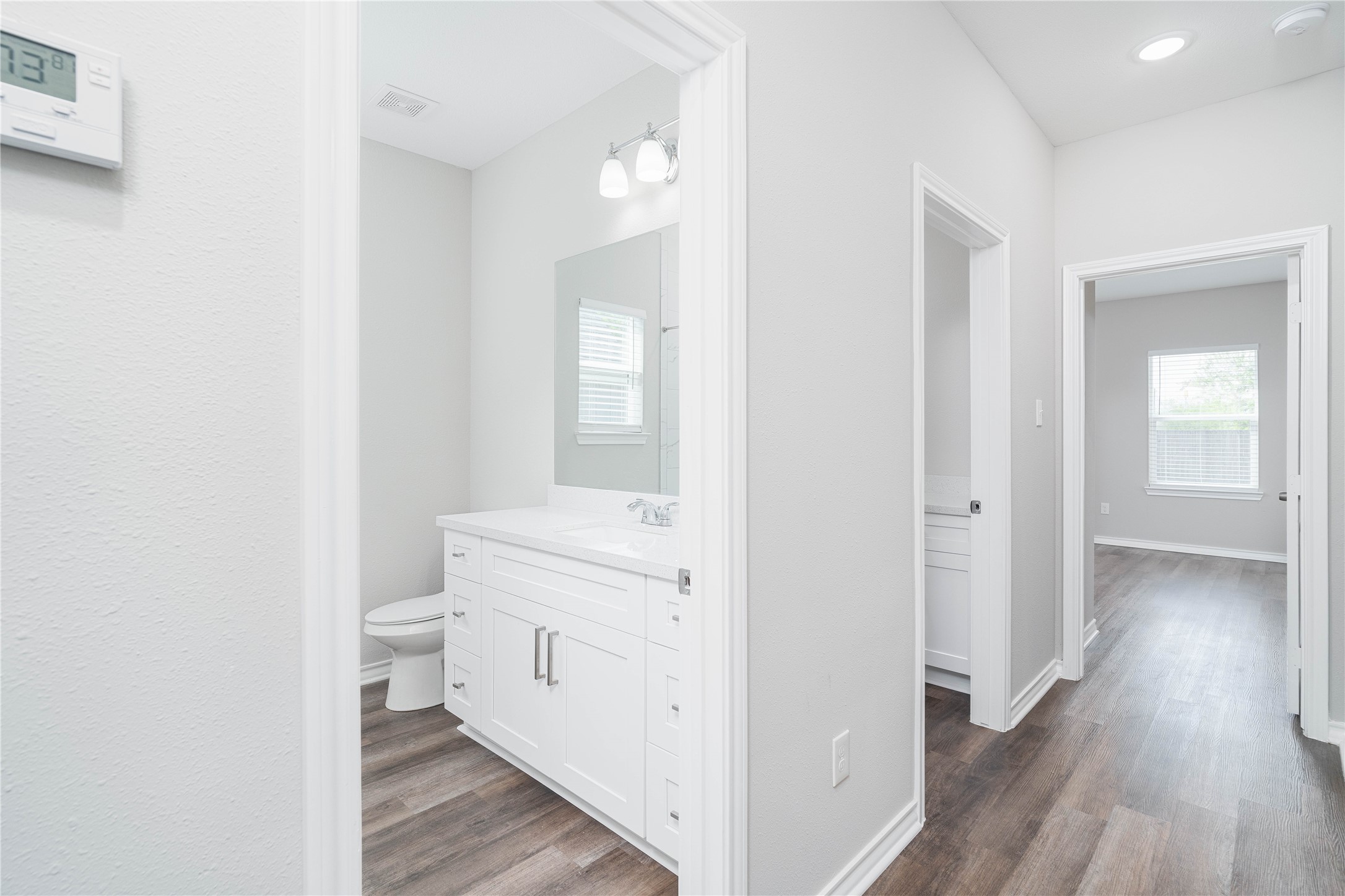 231 McCormick Street Columbus, TX 78934 - Photo 20 of 27 Bathroom – Well-appointed bathroom with a modern vanity, sleek fixtures, and a clean, neutral design.