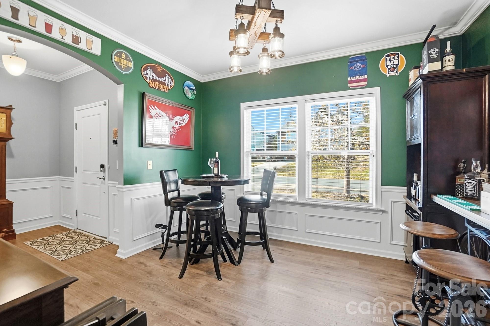 1103 Clover Lane Matthews, NC 28104 - Photo 17 of 46 a view of a dining room with furniture window and outside view