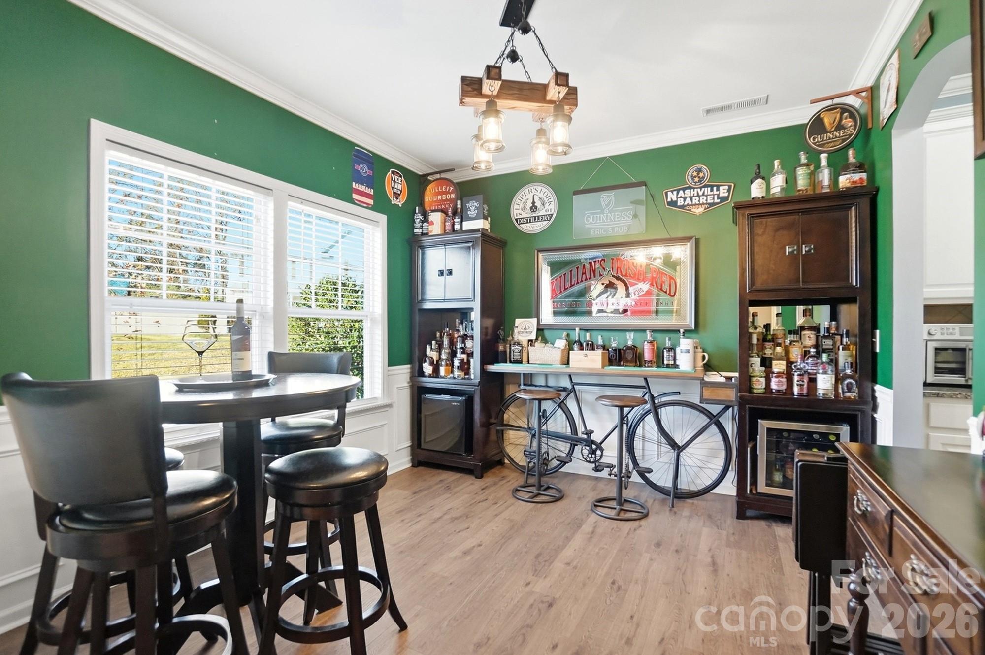 1103 Clover Lane Matthews, NC 28104 - Photo 18 of 46 a view of a dining room with furniture window and outside view
