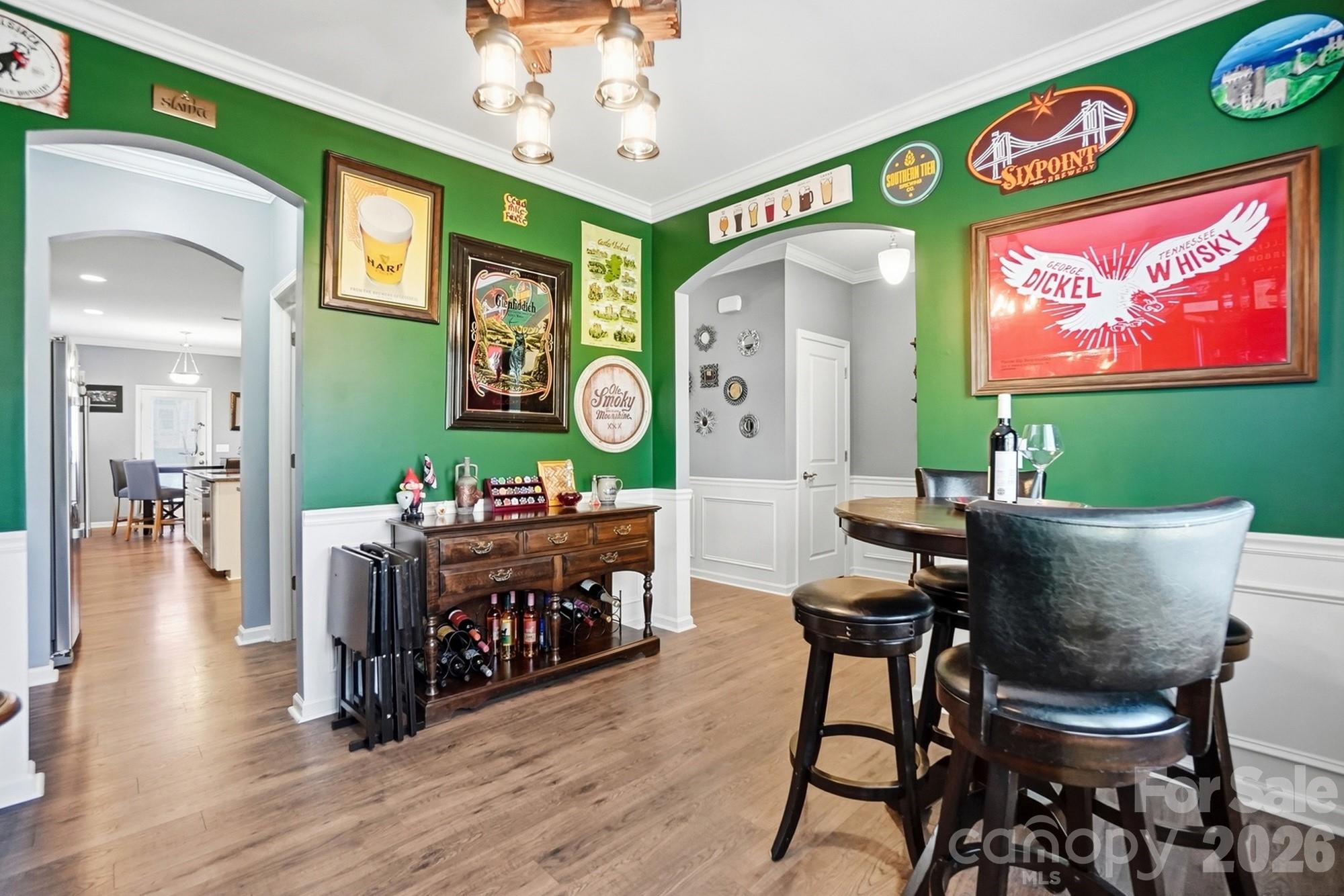 1103 Clover Lane Matthews, NC 28104 - Photo 19 of 46 a living room with furniture and a wooden floor