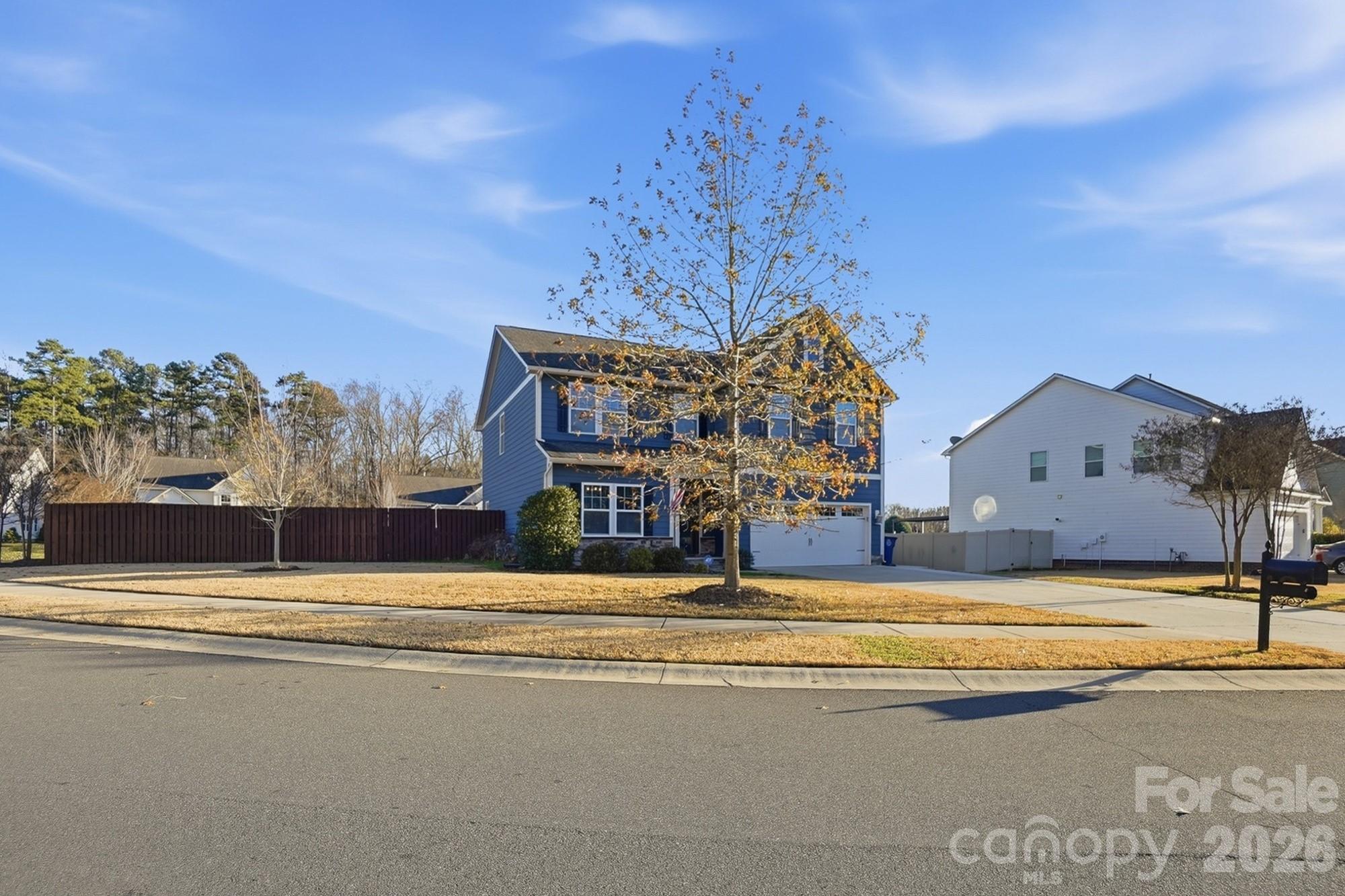 1103 Clover Lane Matthews, NC 28104 - Photo 2 of 46 a view of building with a ocean view