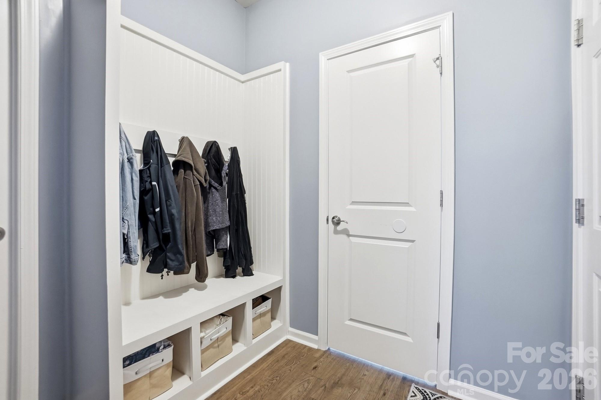 1103 Clover Lane Matthews, NC 28104 - Photo 22 of 46 a view of walk in closet with clothes and shoes