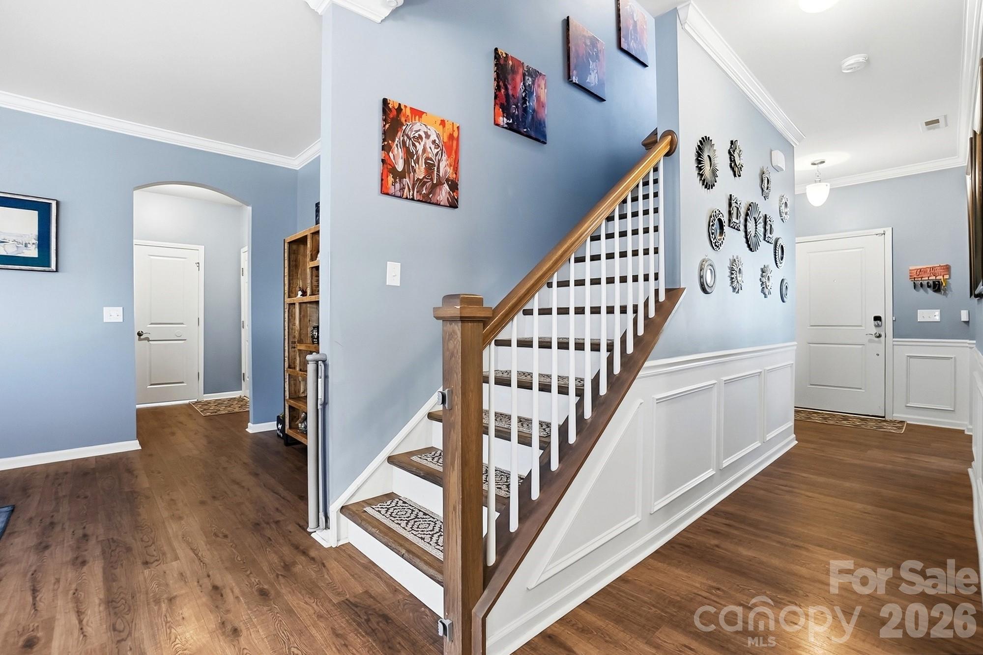 1103 Clover Lane Matthews, NC 28104 - Photo 24 of 46 a view of entryway and hall with wooden floor