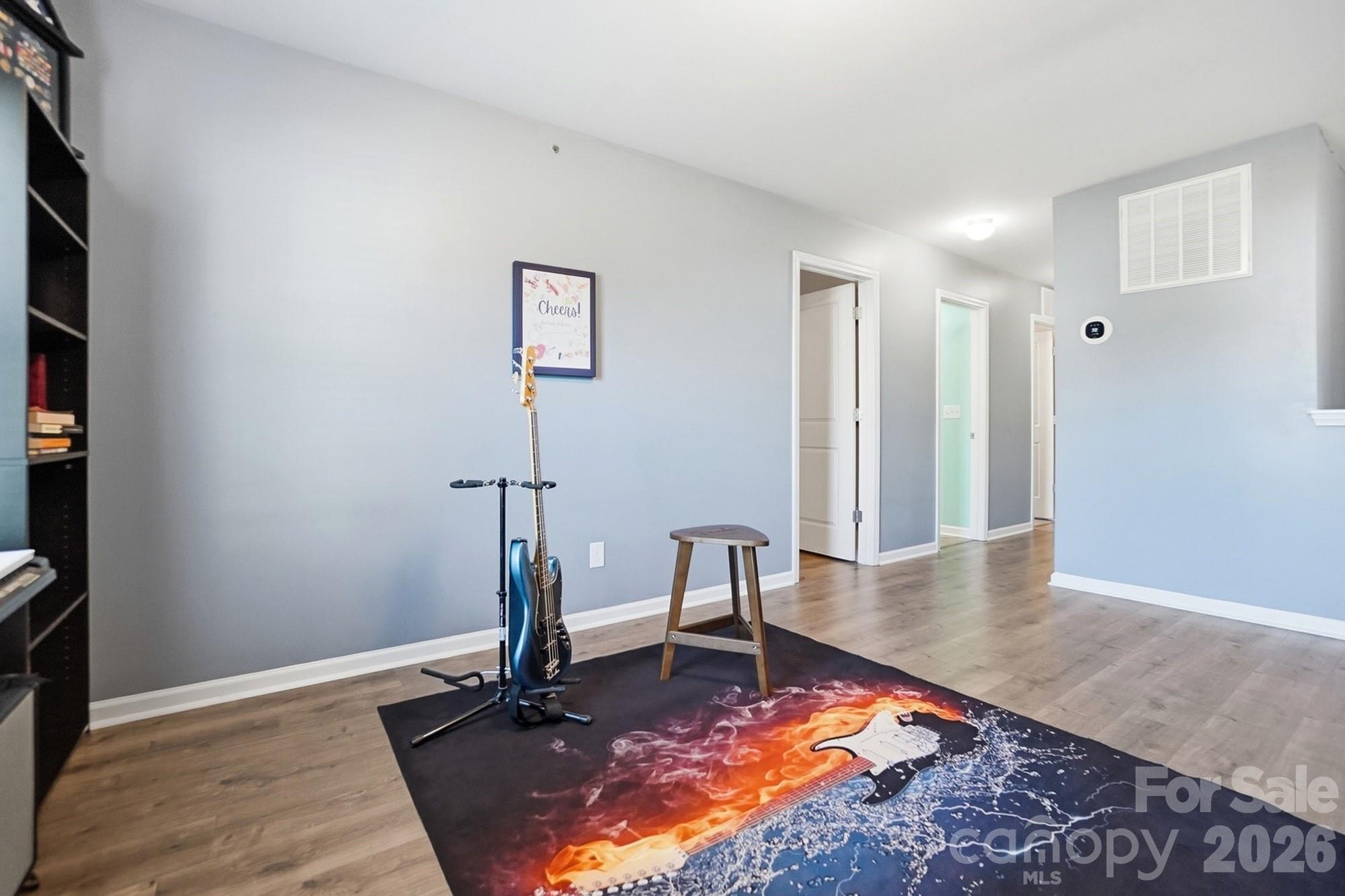 1103 Clover Lane Matthews, NC 28104 - Photo 35 of 46 a view of a room with gym equipment