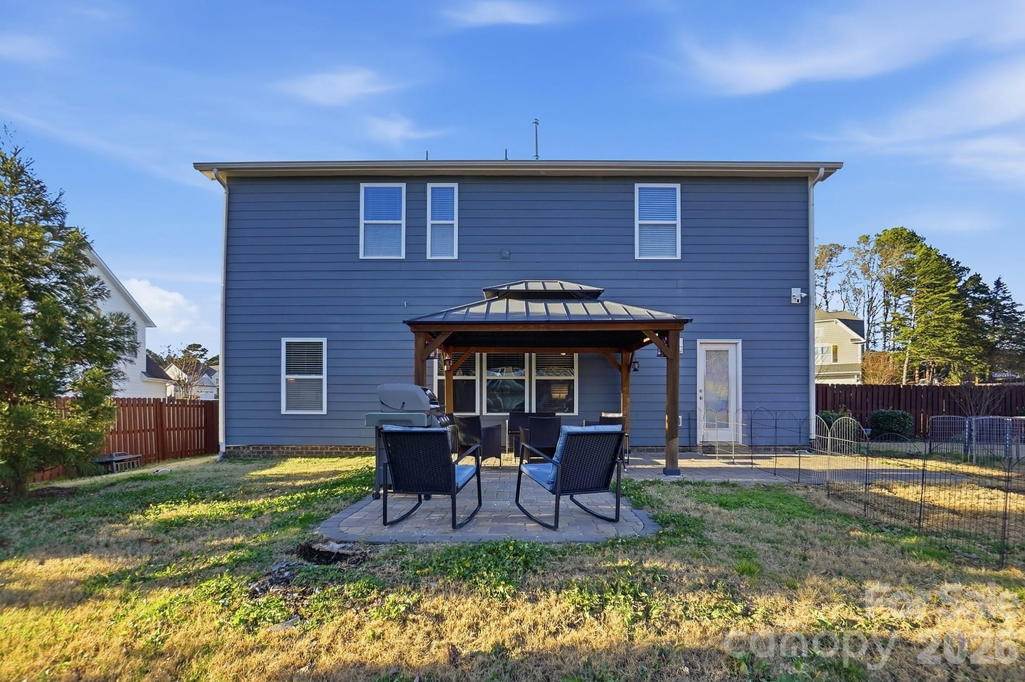 1103 Clover Lane Matthews, NC 28104 - Photo 46 of 46 a house view with a seating space and garden