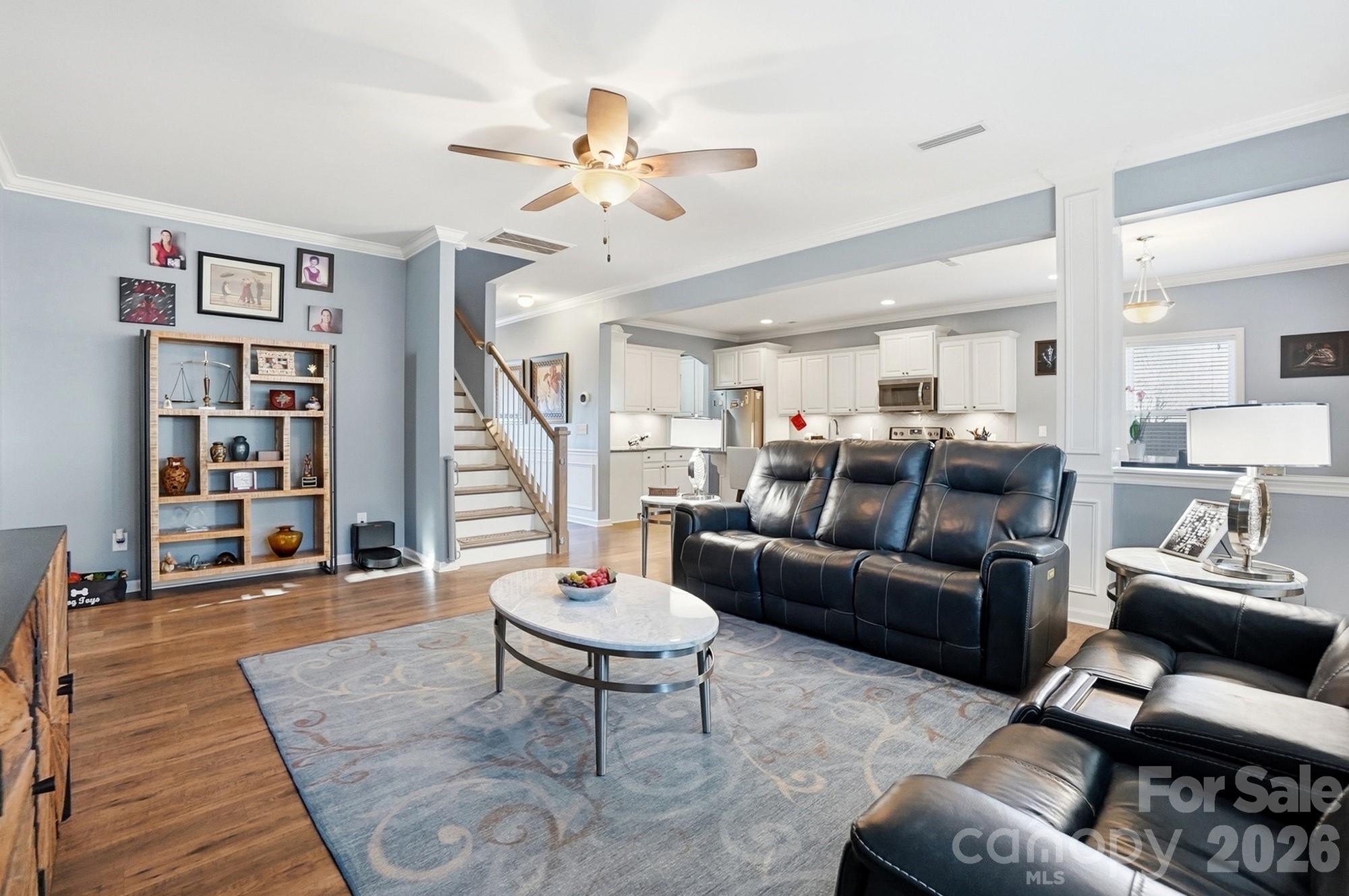 1103 Clover Lane Matthews, NC 28104 - Photo 6 of 46 a living room with furniture and wooden floor