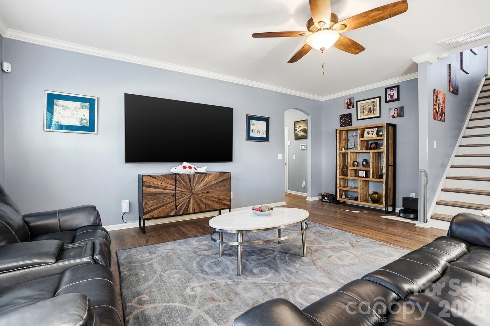 1103 Clover Lane Matthews, NC 28104 - Photo 7 of 46 a living room with furniture and a flat screen tv