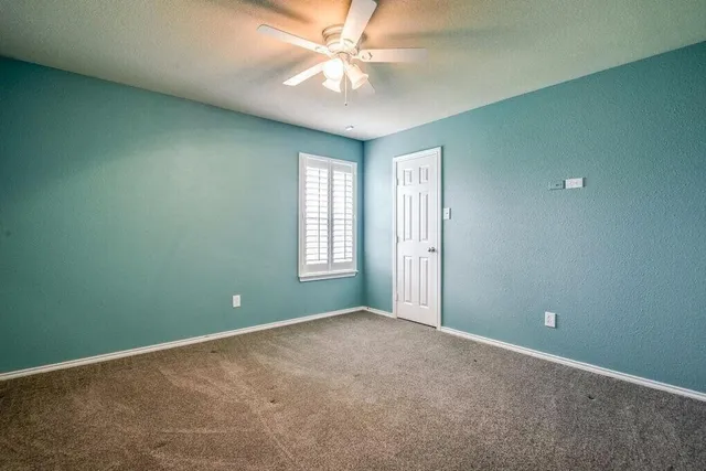 an empty room and windows