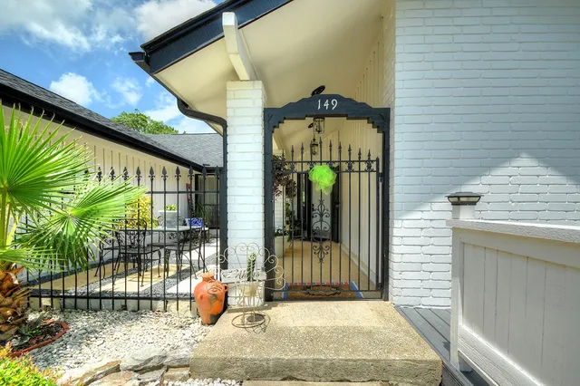 a house view with a garden space