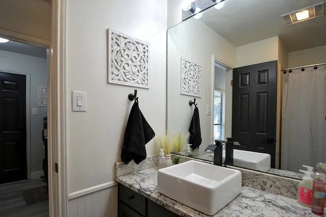 a outdoor living space with furniture and a garden