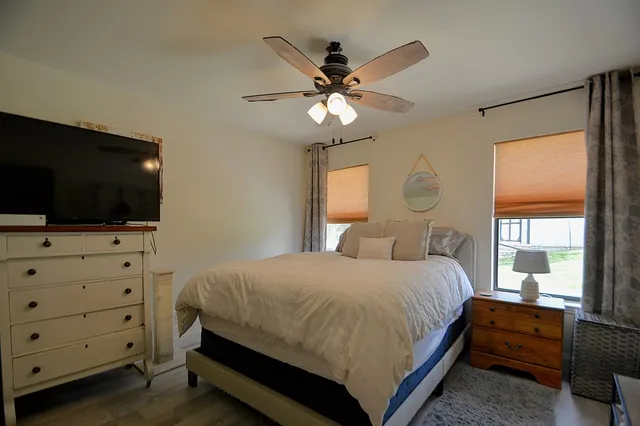 a view of swimming pool with outdoor seating and yard