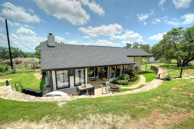 a house with trees in front of it