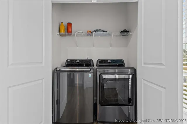 a kitchen with stainless steel appliances granite countertop a sink a stove top oven a counter space and cabinets