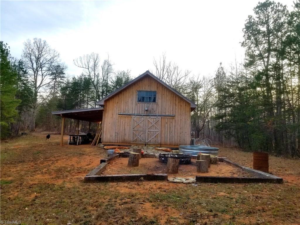 2750 Horseshoe Neck Road Lexington, NC 27295 - Photo 1 of 19 Barn Built in 2018 and insulated walls and ceiling. Has Multi zone Heat and Air. Has an upstairs loft for sleeping area .Barn Home is a project that needs some finishing or repurposing . Make a good hunting lodge! Sliding Exterior door protect french doors .