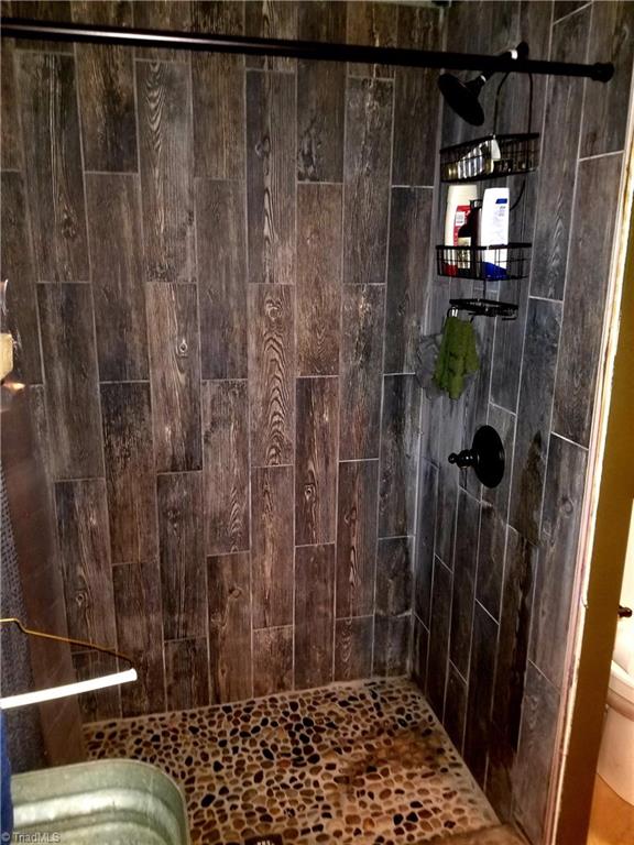 2750 Horseshoe Neck Road Lexington, NC 27295 - Photo 9 of 19 Tile shower with river rock floor