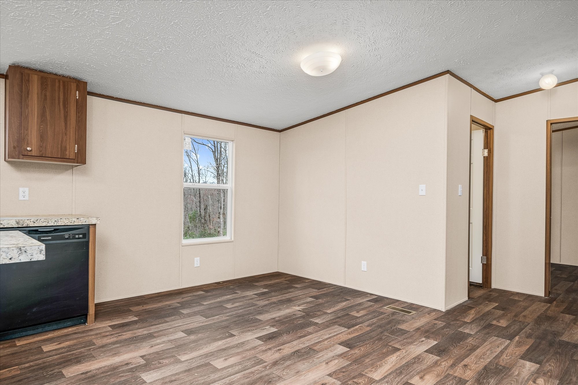 750 Maple Branch Road Sparta, TN 38583 - Photo 15 of 36 a view of empty room with wooden floor and fan