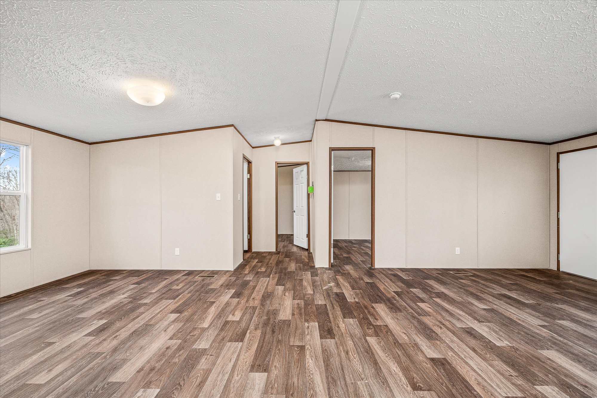750 Maple Branch Road Sparta, TN 38583 - Photo 10 of 36 a view of empty room with wooden floor