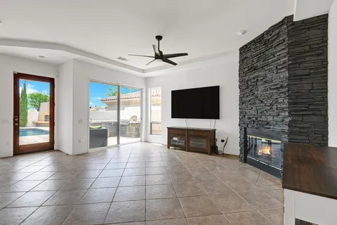 a view of living room with furniture and flat screen tv