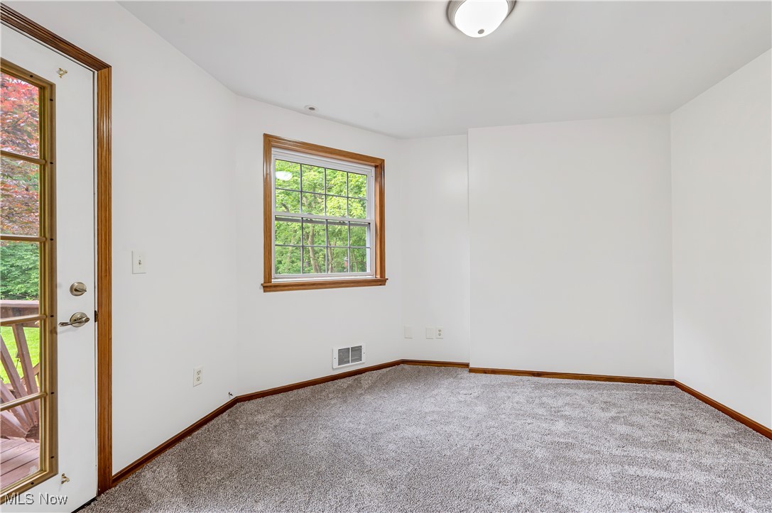 12358 Harmon Road New Springfield, OH 44443 - Photo 30 of 44 Spare room with carpet and baseboards