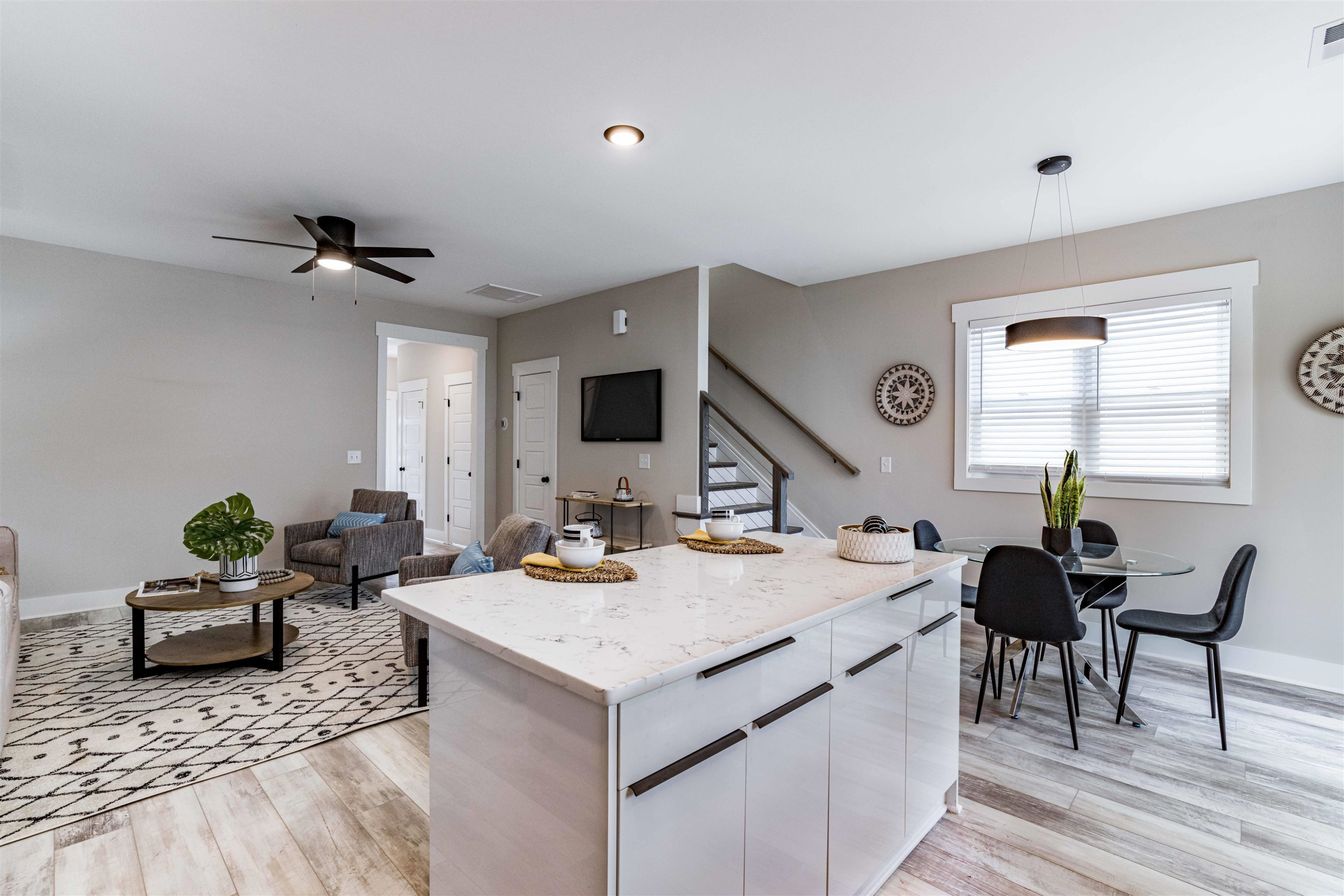 1035 Nano Tech Circle Durham, NC 27704 - Photo 15 of 38 a living room with stainless steel appliances kitchen island granite countertop furniture a rug and a window