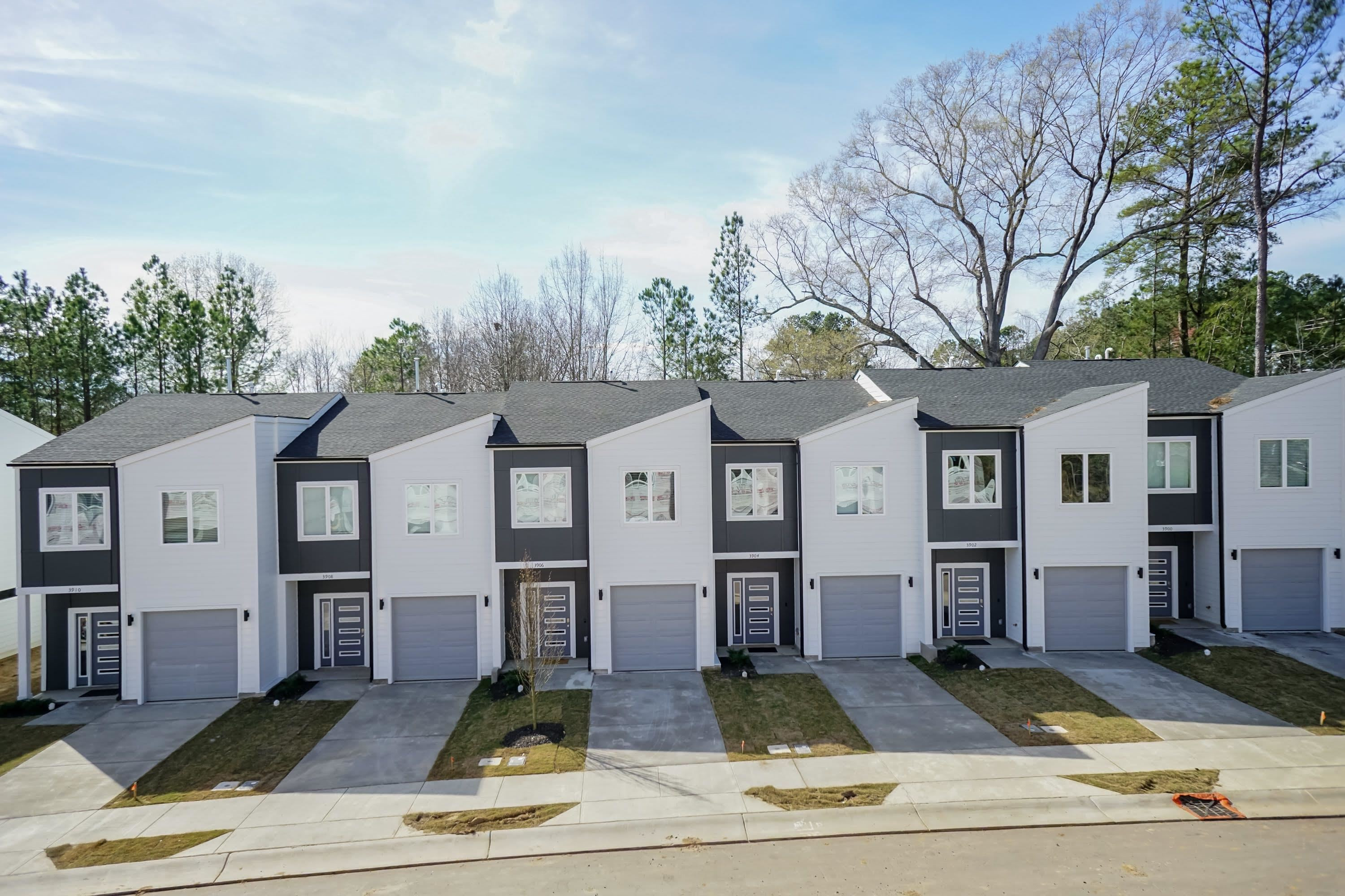 1035 Nano Tech Circle Durham, NC 27704 - Photo 2 of 38 a view of a city street lined with buildings
