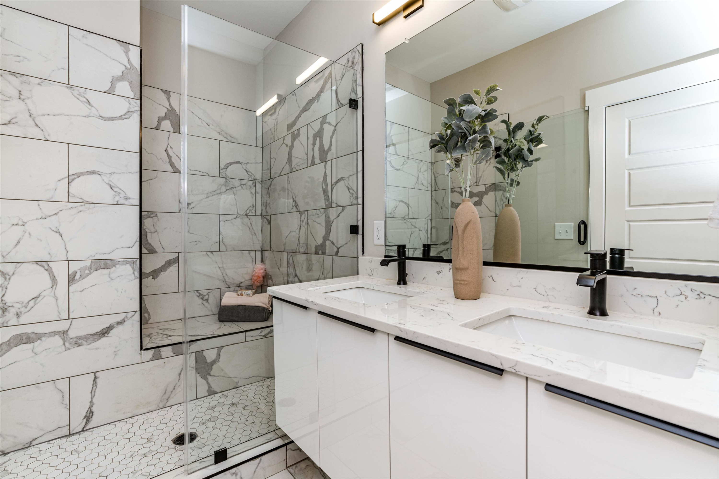 1035 Nano Tech Circle Durham, NC 27704 - Photo 21 of 38 a bathroom with a granite countertop sink a mirror and shower