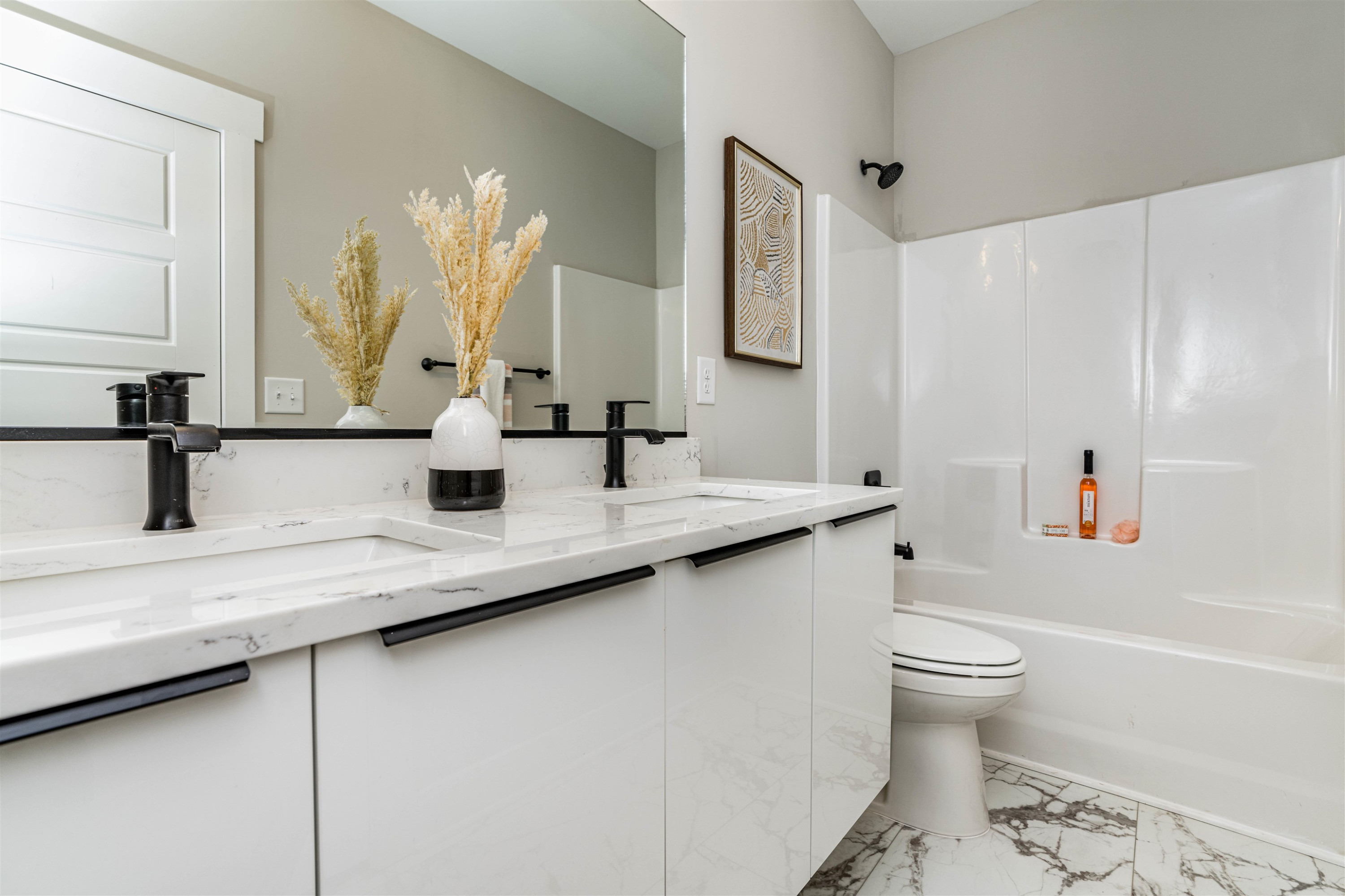 1035 Nano Tech Circle Durham, NC 27704 - Photo 26 of 38 a bathroom with a granite countertop sink a toilet and a mirror