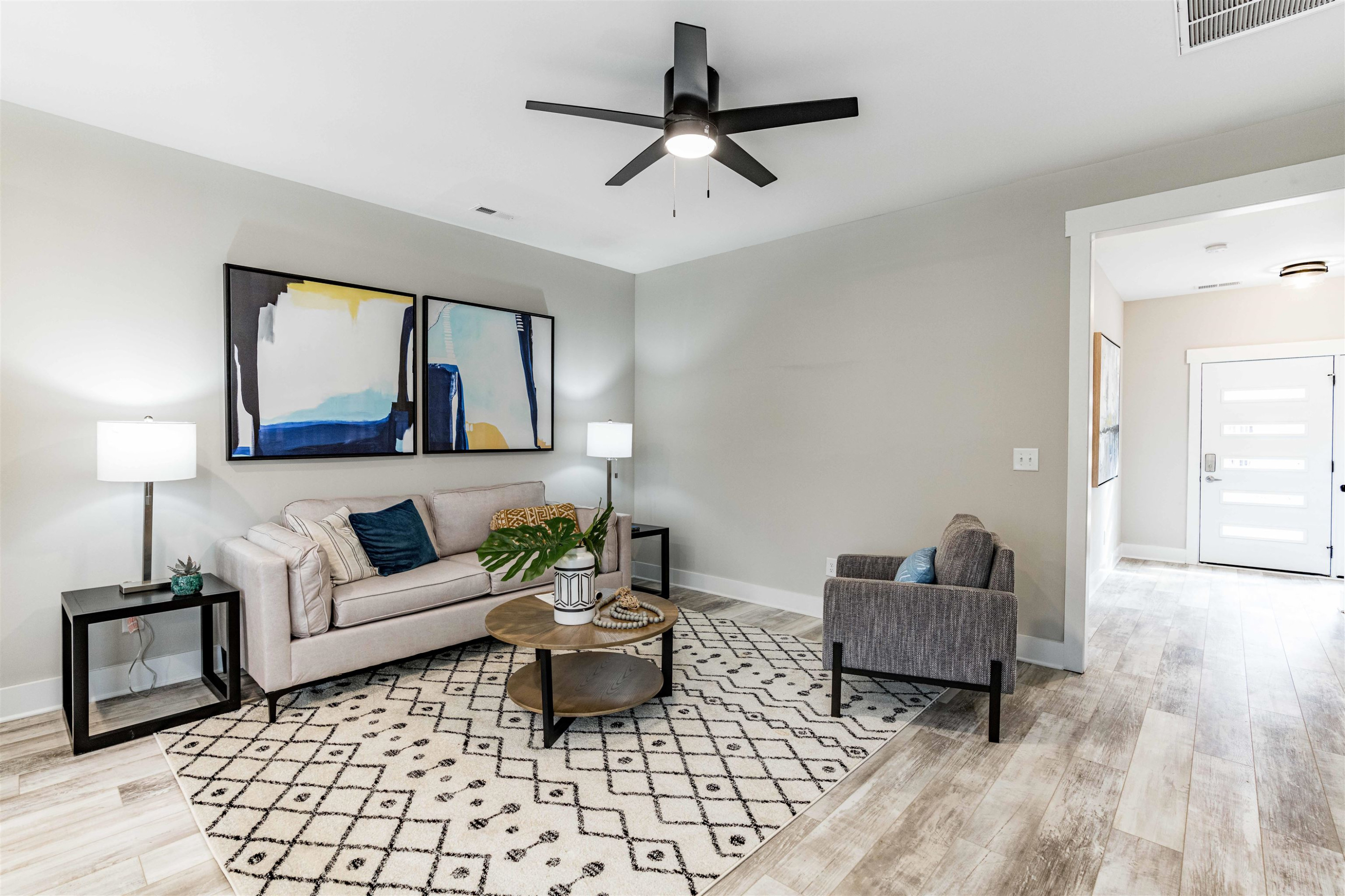 1035 Nano Tech Circle Durham, NC 27704 - Photo 9 of 38 a living room with furniture and a rug